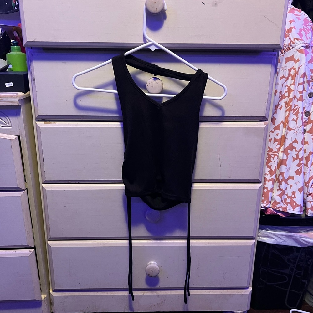 halter side tie top size small but fits as a medium